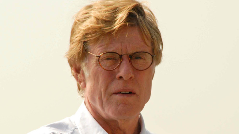 Robert Redford wearing glasses