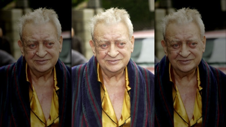 Rodney Dangerfield posing for a photo