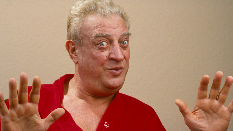 Rodney Dangerfield posing for a photo