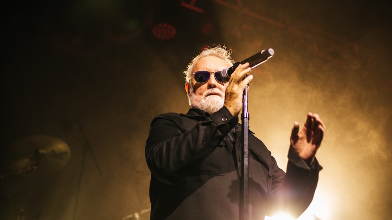 Roger Taylor singing on stage 2021