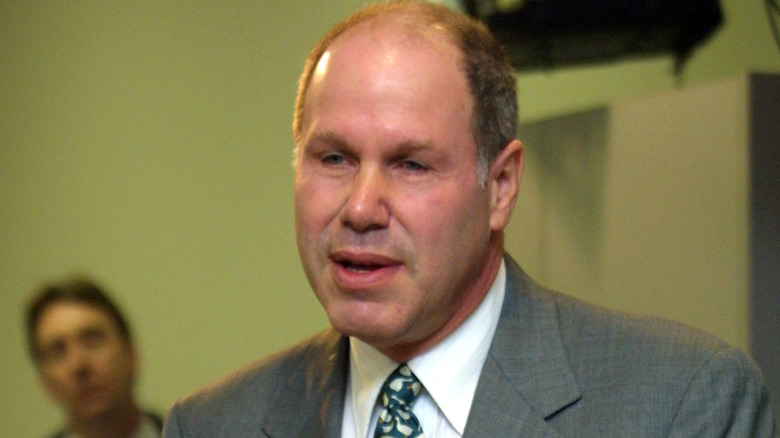 Michael Eisner grey suit talking