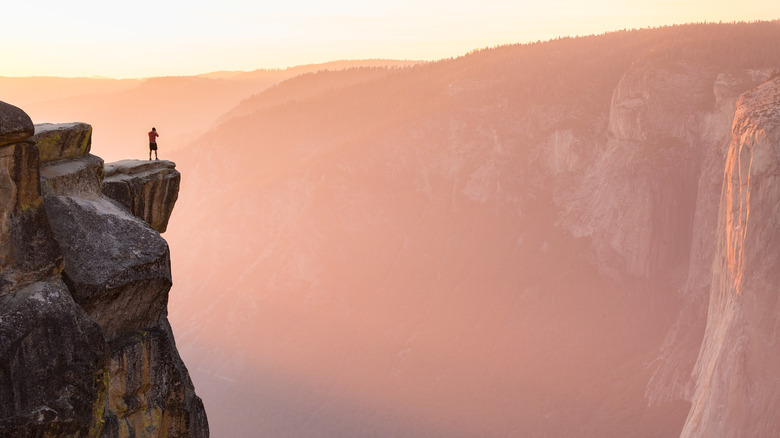 Man on cliff at Yosemite