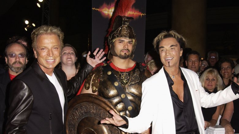 Siegfried and Roy and an unnamed gladiator