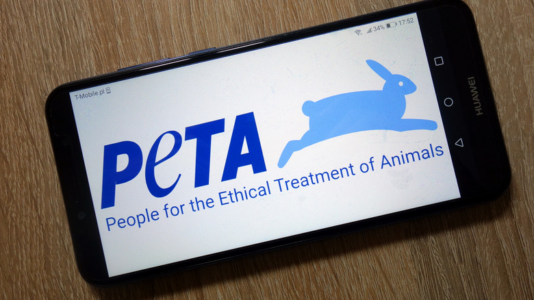 A PETA logo on smartphone