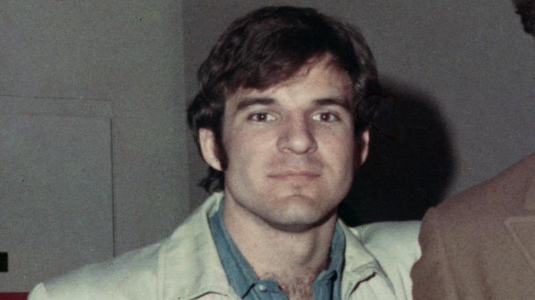 Steve Martin wearing a suit in the 1960s