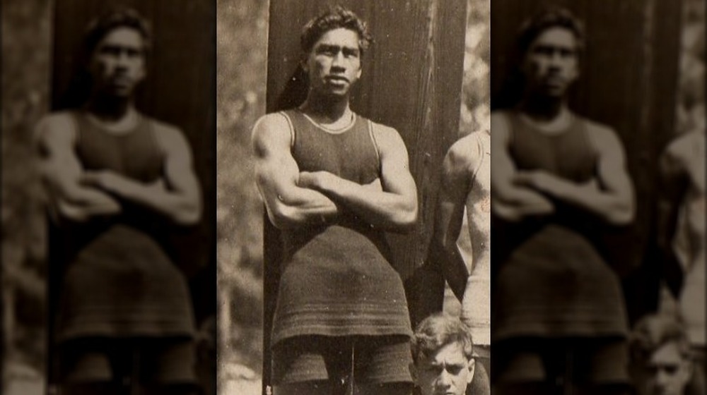 Duke Kahanamoku with surfboard