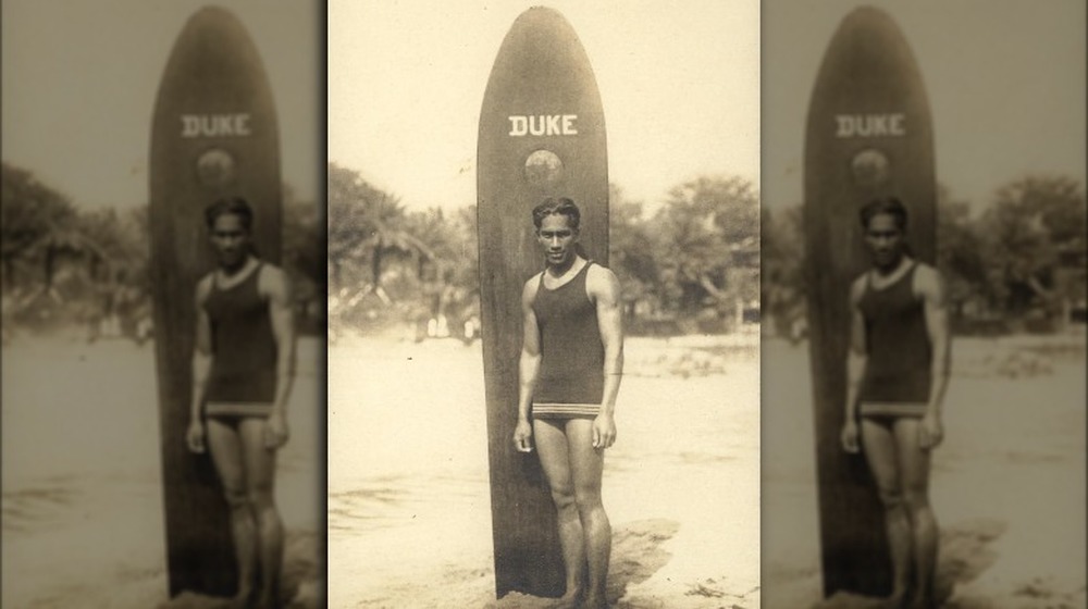 Duke Kahanamoku with surf board