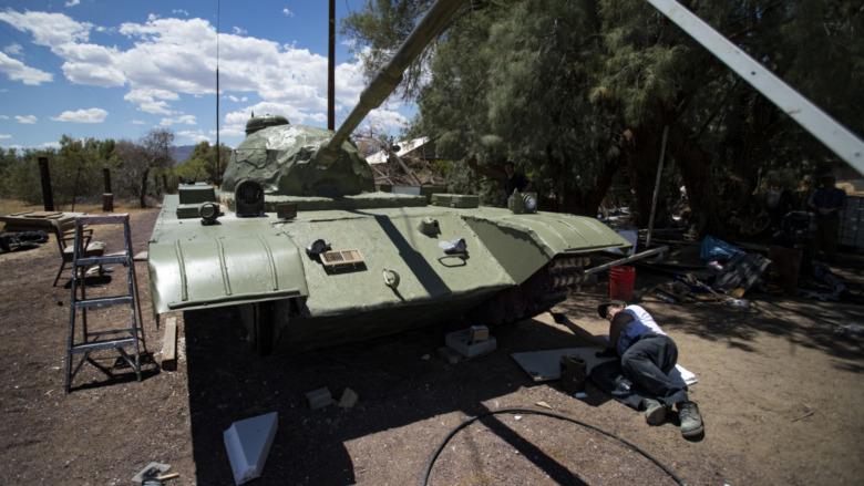 Sculptor Weiming Chen finishes up his Tank Man piece