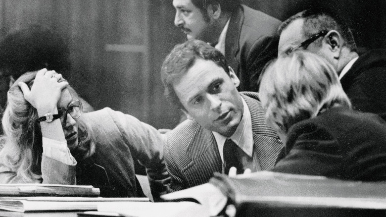 Ted Bundy consults with his attorneys in court