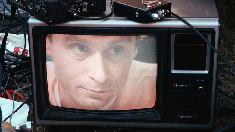 Ted Bundy's face on television screen