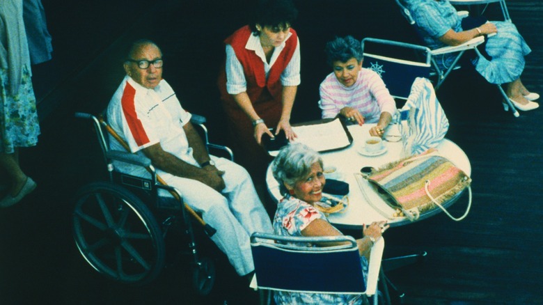 Leon Klinghoffer and wife sitting at table