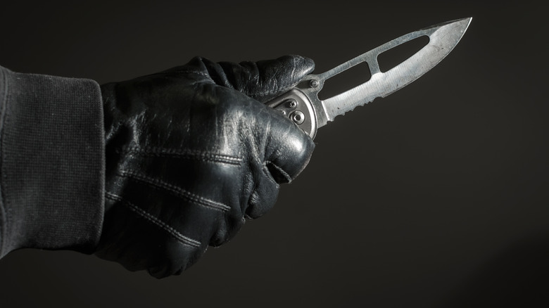 Hand with knife