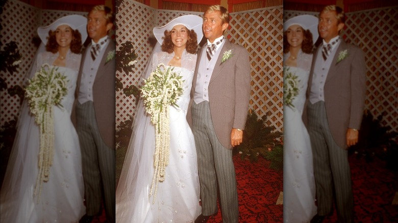 Carpenter and Burris smiling at their wedding