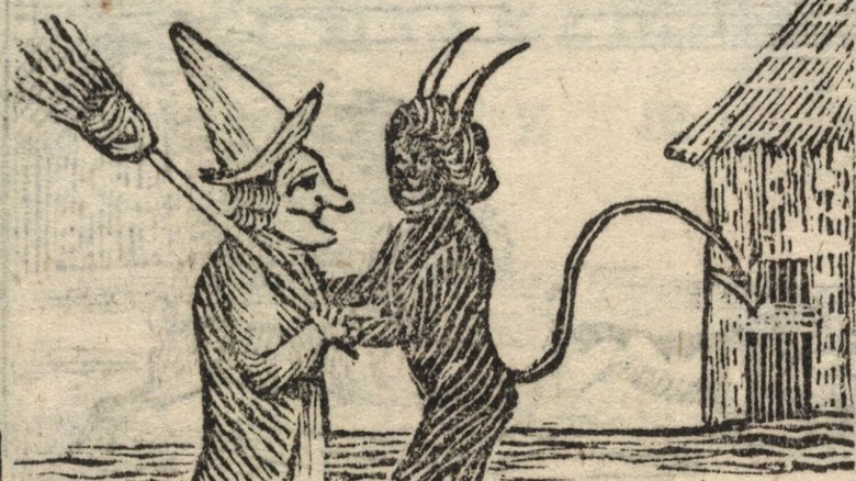 devil witch broom hug