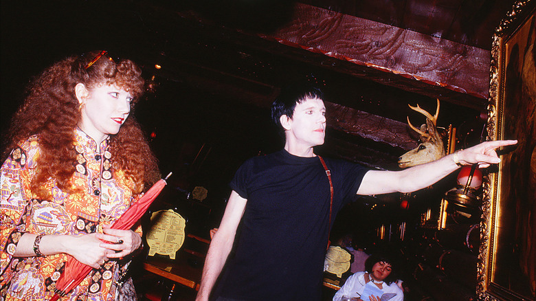 Poison Ivy and Lux Interior pointing