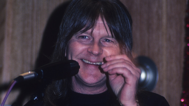 Randy Meisner smiling at microphone