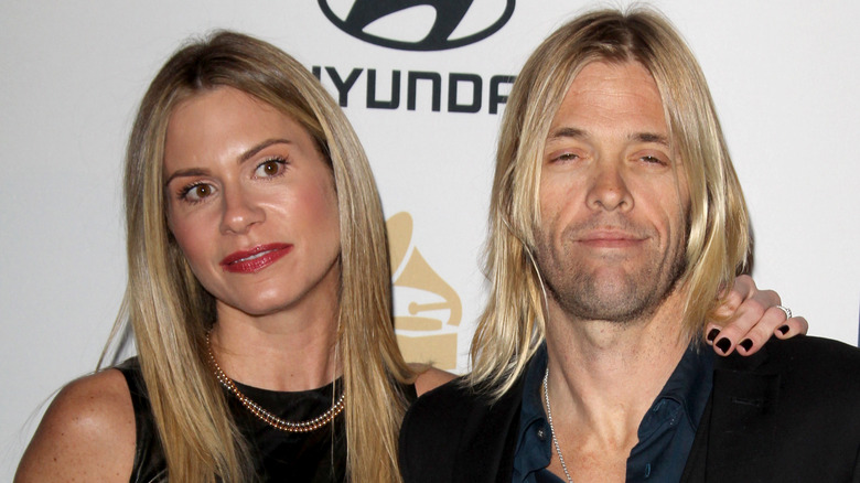 Alison Hawkins and Taylor Hawkins smiling 