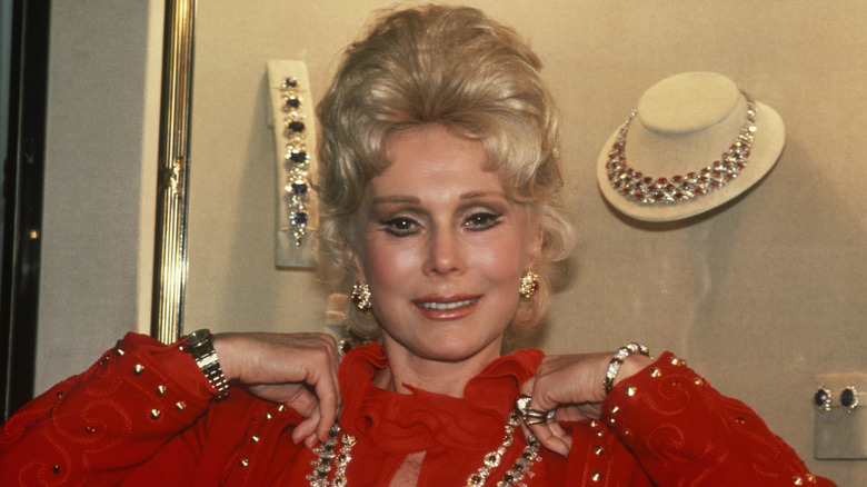 Eva Gabor posing with jewelry 