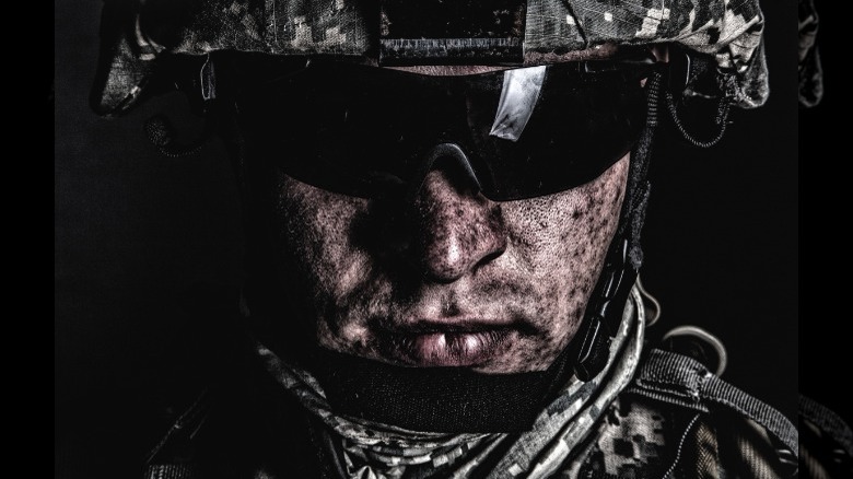 Special Forces soldier wearing sunglasses and helmet