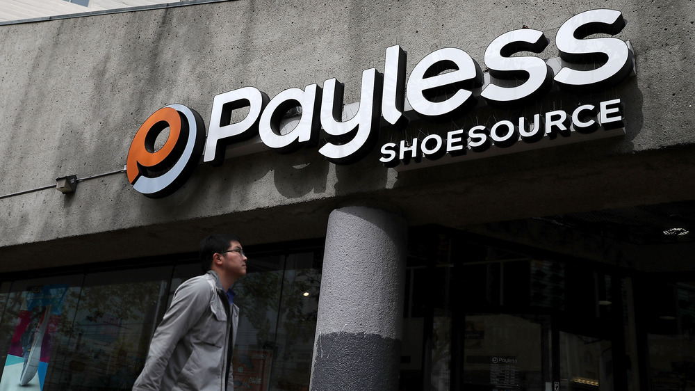 Man walking by Payless Shoe Source