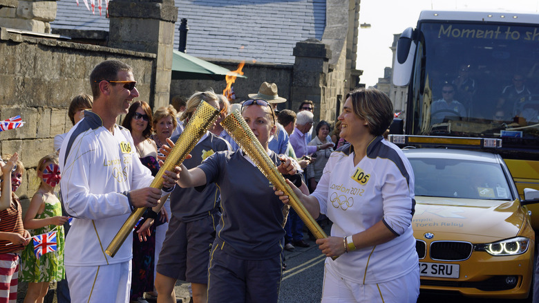 passing olympic torch