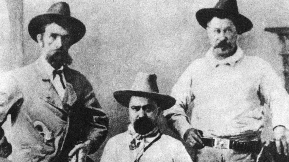William A Pinkerton, flanked by two express agents