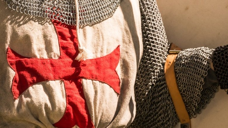 Knight uniform with red cross