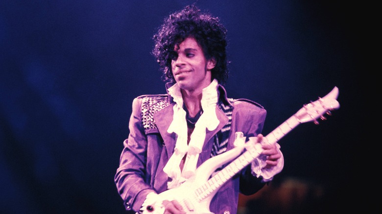 Prince playing guitar