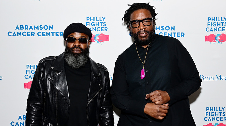 Black Thought and Questlove posing