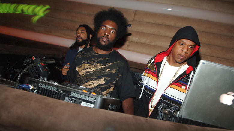 Questlove and Jay-Z hanging out