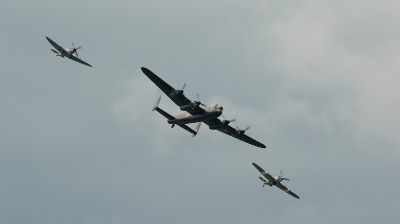 Lancaster bomber with fighter escort