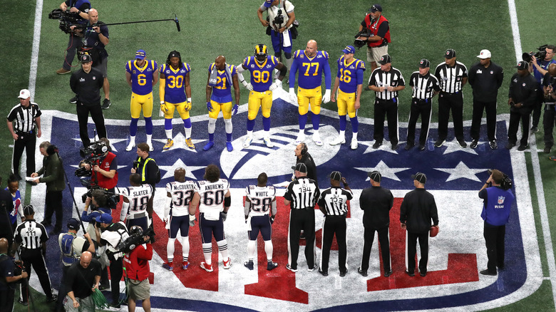 NFL teams standing coin toss