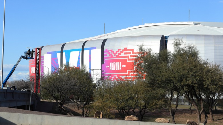 State Farm Stadium green trees Arizona mural