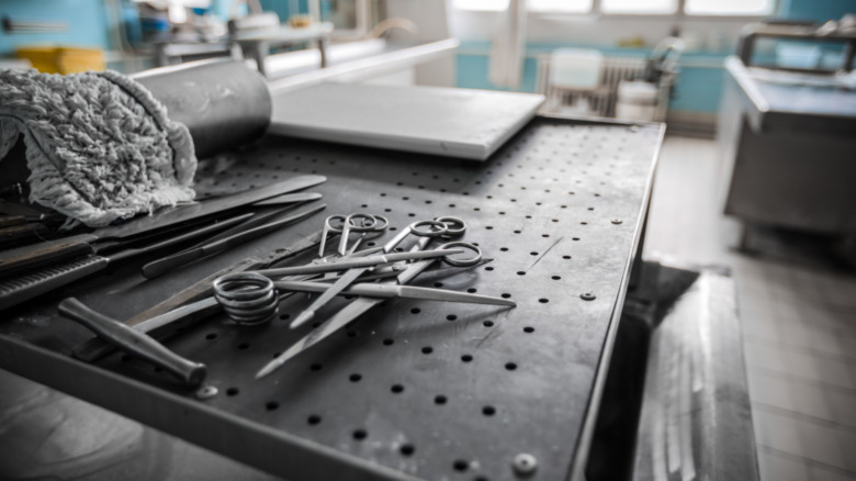 Autopsy table with tools