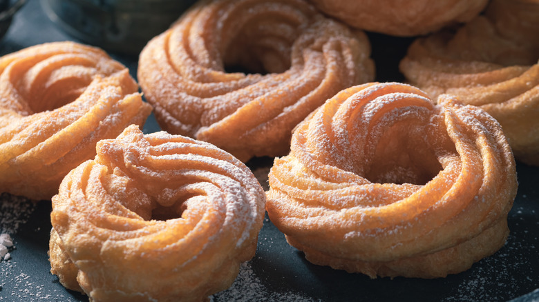 Homemade Spanish donuts with powdered sugar