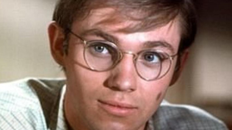 Richard Thomas smiling in glasses on The Waltons