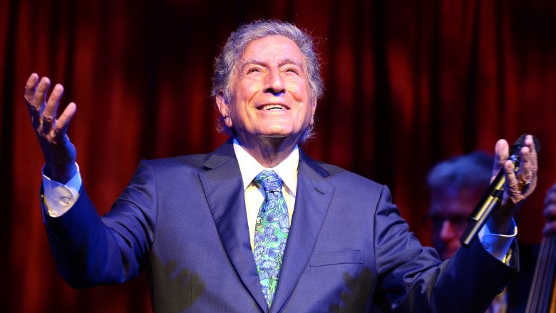 Tony Bennett looking to the heavens on stage