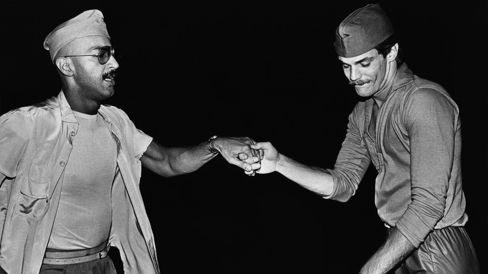 Two men dance together during a 1978 New Year's Eve party at the "Backlot," a popular gay disco in West Hollywood, California. 