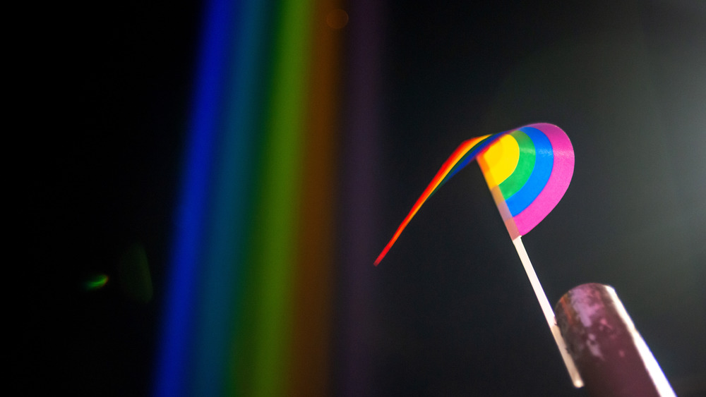  A pride flag waves near Pride colored lights projected into the sky on June 27, 2020 in New York City. 