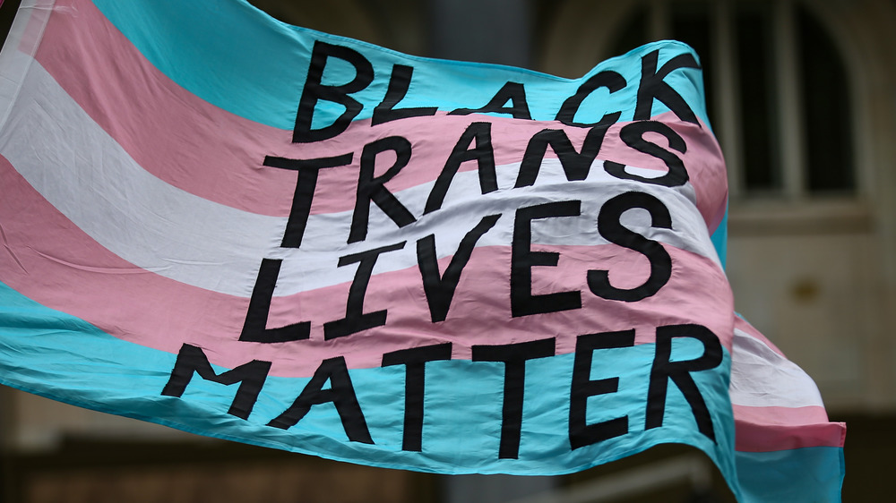 A Black Trans Lives Matte flag is flown during a BTLM march on June 27, 2020