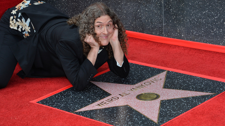 "Weird Al" Yankovic posing with his star