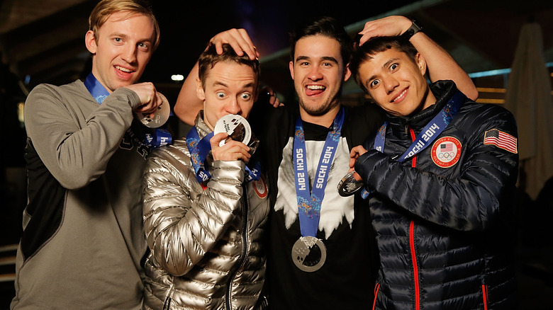 Eddy Alvarez with teammates