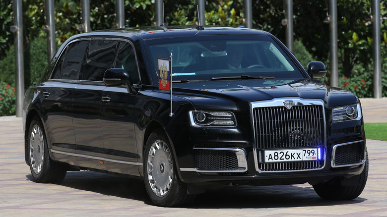 a limo with flag