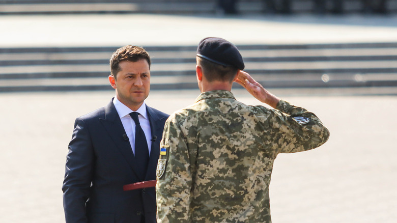 Volodymyr Zelensky with a soldier