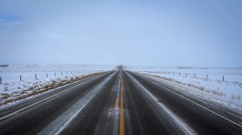 Snowy prairie road