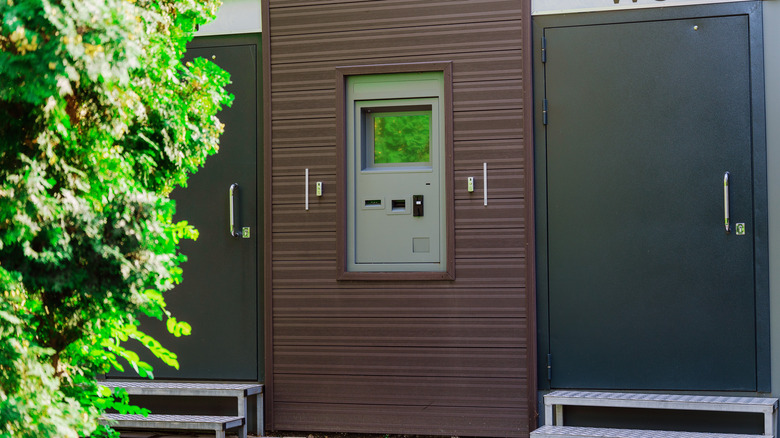 a pay toilet in a park