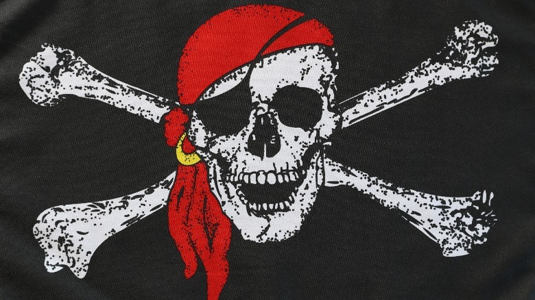Jolly Roger with red head scarf