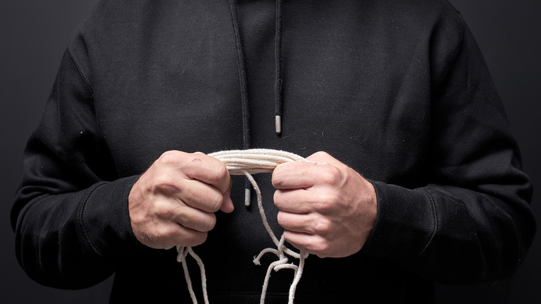 Man holding rope