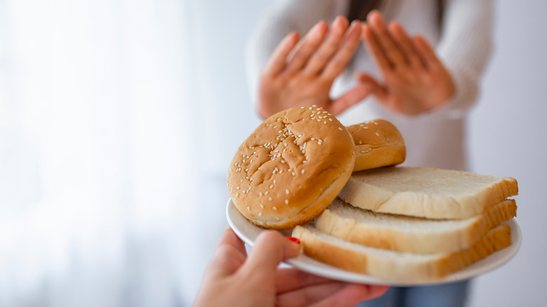 woman saying no to gluten