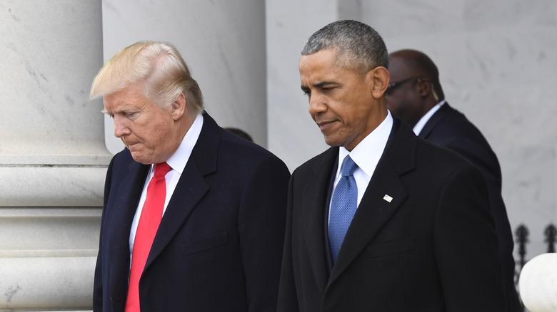 Donald Trump and Barack Obama black suits